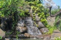 Small waterfall in the yard of Khanh An Monastery, Ho Chi Minh City Royalty Free Stock Photo