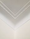 Small wave pattern crown molding in luxury home ceiling. Ornamental at the corner. Vertical photo image. Royalty Free Stock Photo