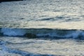 small waves at greek island kalymnos at sunset Royalty Free Stock Photo