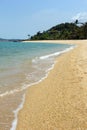 Small waves hitting the Maenam Beach at Koh Samui, Thailand Royalty Free Stock Photo