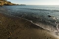 Small waves on Killiney beach, Dublin, Ireland. Royalty Free Stock Photo