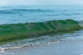 Small waves of the sea in green. Royalty Free Stock Photo