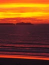 Small waves on a sunset Cornish beach Royalty Free Stock Photo