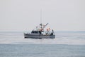 Small white boat in the ocean