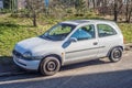 Small white car Opel Corsa left side and front view Royalty Free Stock Photo