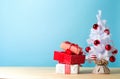 Small white christmas tree with presents Royalty Free Stock Photo