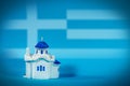 Small White Church with Blue Dome - Souvenir made in Greece Royalty Free Stock Photo