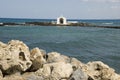 Small white church in midth of sea, crete - greece Royalty Free Stock Photo