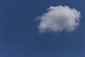 Small white cloud in a blue sky Royalty Free Stock Photo