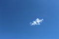 Small white cloud in clear blue sky at daytime Royalty Free Stock Photo