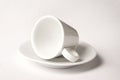 Small white coffee cup isolated on white Royalty Free Stock Photo