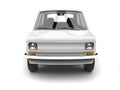 Small white compact vintage car - front view Royalty Free Stock Photo