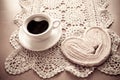 white cup of black coffee and a sweet buttery cookie on the table Royalty Free Stock Photo