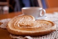 white cup of black coffee and a sweet buttery cookie on the table Royalty Free Stock Photo