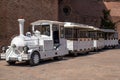 Small white electric tourist city train