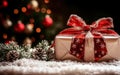 A small white gift box adorned with a bright red bow. Royalty Free Stock Photo
