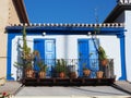 Small White Greek House With Blue Doors