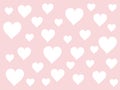 Small white heart shape isolated on light pink pastel background. Royalty Free Stock Photo