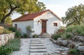 Small white house in serene outdoor setting, tiny homes photo