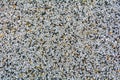 Small White pebble background. Top view of white and yellow gravel stone texture