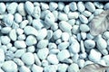 Small white pebbles texture closeup. Natural background blue color toned Royalty Free Stock Photo