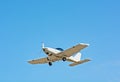 Small white plane in the sky Royalty Free Stock Photo