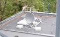 Small white satellite antenna