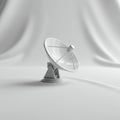 A small, white satellite dish model is placed on a plain surface. Made of a smooth Royalty Free Stock Photo