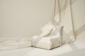 Small white sofa sea in a white room with white cloth Royalty Free Stock Photo