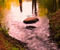 A small white-soft river running over the rocks Royalty Free Stock Photo