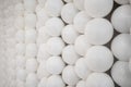 Small white spheres and flat circle shapes wall for Interior design.