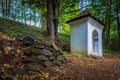 Small white structure in a beautiful forest. Calvary over Kremnica town in Slovakia.