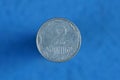 White Ukrainian coin two pennies on a blue background Royalty Free Stock Photo