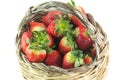 Small wicker basket with strawberries Royalty Free Stock Photo