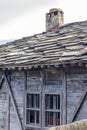 Small window of abandoned old wooden house Royalty Free Stock Photo