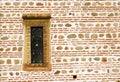 Small window on ancient wall Royalty Free Stock Photo