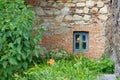 Small window in the brick wall Royalty Free Stock Photo