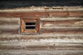 Small window, log wall Royalty Free Stock Photo