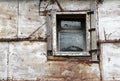 Small window of old rusty barn