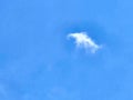 Small Wispy Cloud On Blue Sky Royalty Free Stock Photo