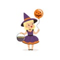 Small witch girl holding bowler full of candies and balloon with scary face, cute kid in halloween costume vector