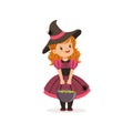 Small witch girl holding bowler full of candies, cute kid in halloween costume vector Illustration