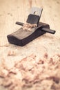 Small wood planer and shavings closeup