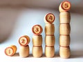 Small wooden barrels with numbers built in columns. The concept of progressive movement in achieving the goal. The