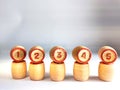 Small wooden barrels with numbers built in a row. The concept of progressive movement in achieving the goal