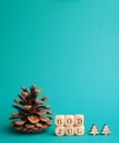 Small wooden blocks with the inscription God Jul, Scandinavian Merry Christmas, turquoise background Royalty Free Stock Photo
