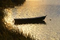 Small wooden boat on the lake Royalty Free Stock Photo