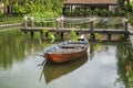 Small wooden boat on the Lang Co Bay, where you can see the bridge on Ah1 Road across the Lang Co Bay to the Hai Van Tunnel, Royalty Free Stock Photo