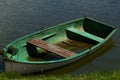 Small wooden boat WITHOUT oars in summer Royalty Free Stock Photo