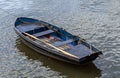 Small wooden boat on the same Royalty Free Stock Photo